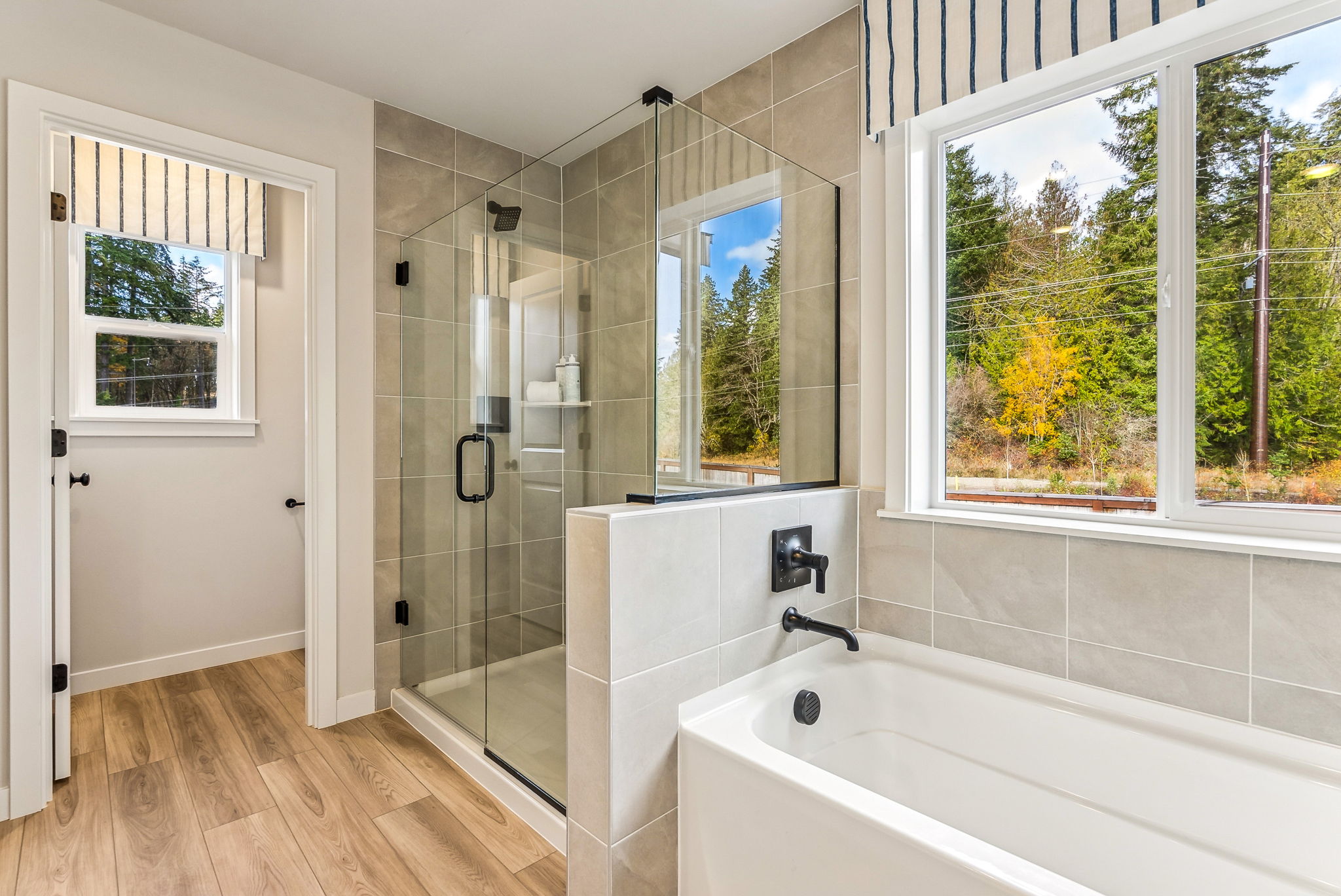 A bathroom with a glass shower.