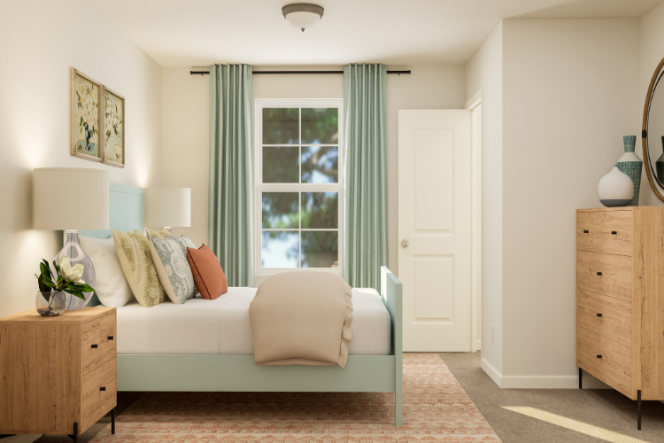 A room with a bed and a window.