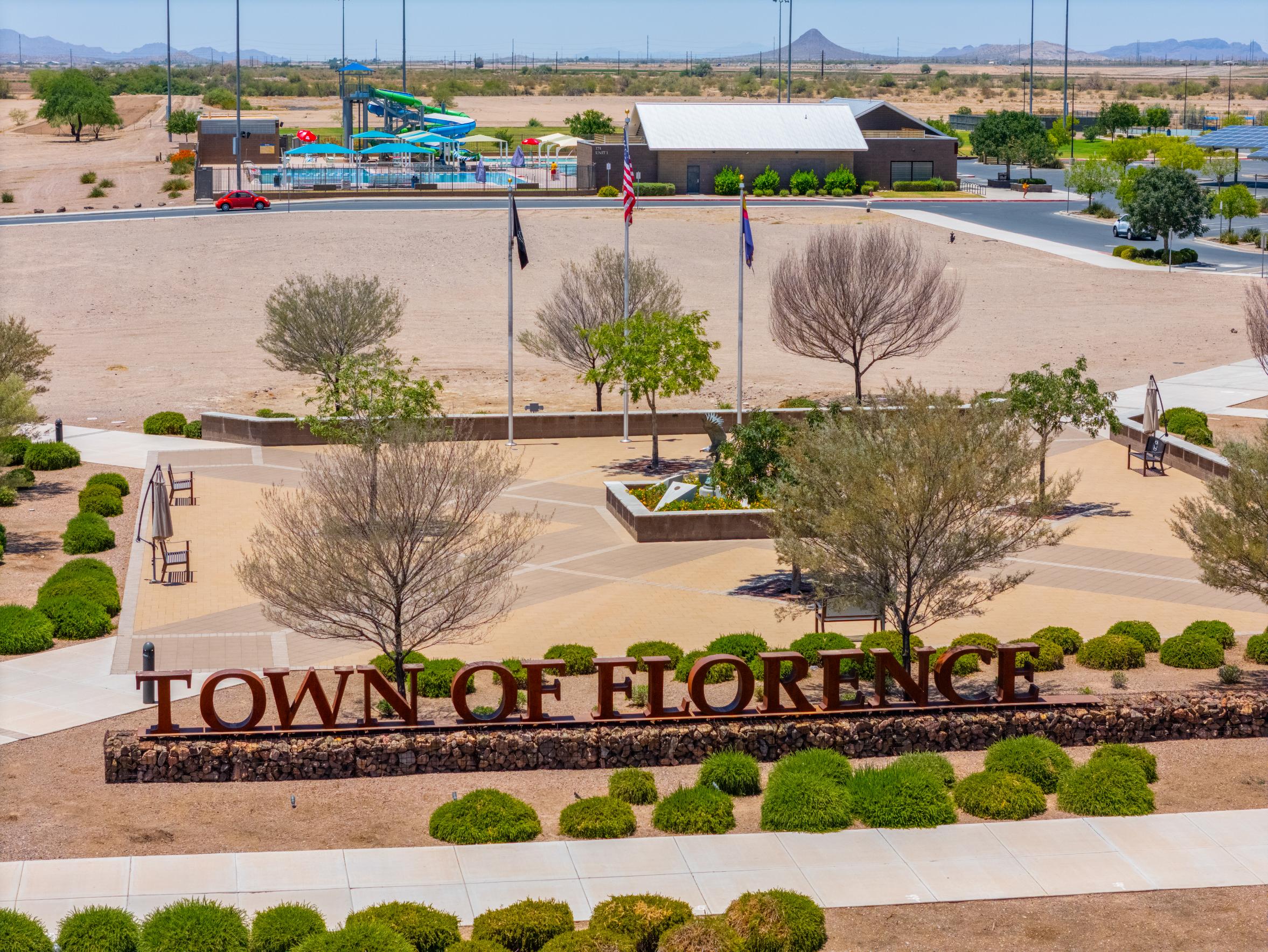 A large building with a parking lot.