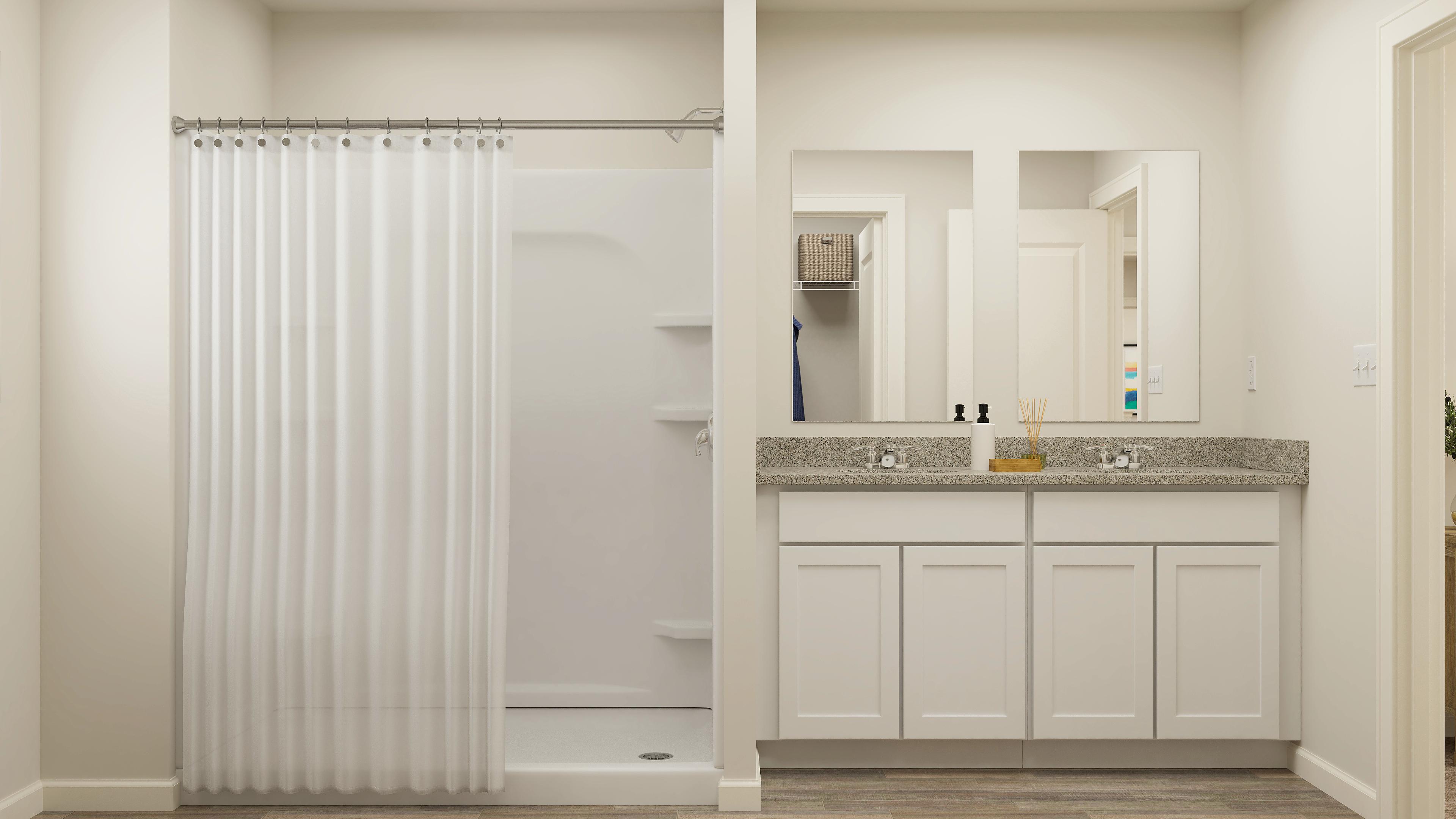 A bathroom with a shower curtain.