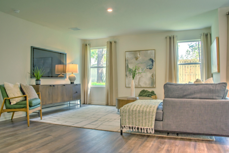 A living room with a large window.