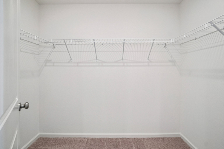 A white bathtub in a room.