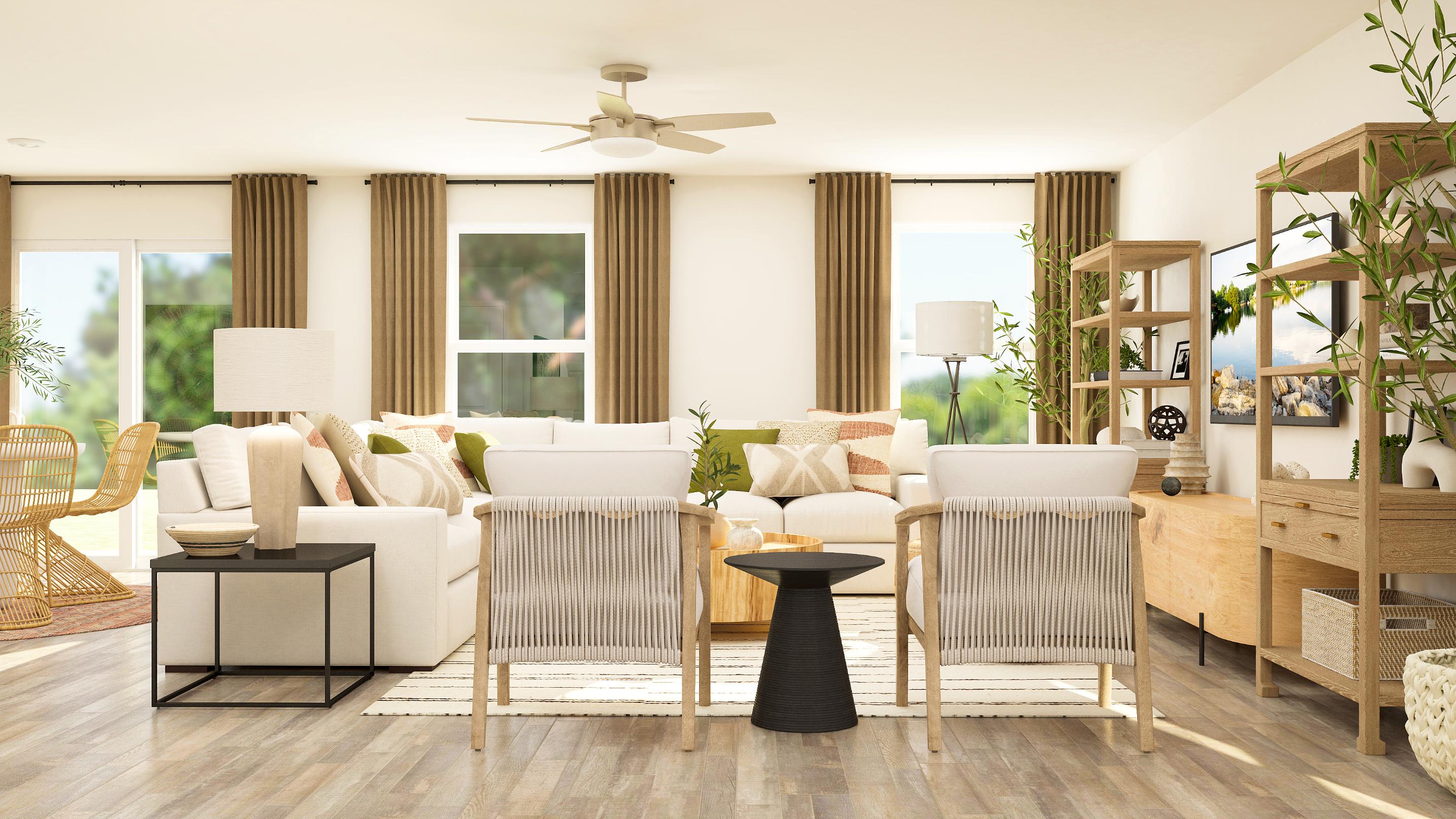 A living room with a white couch and a table.